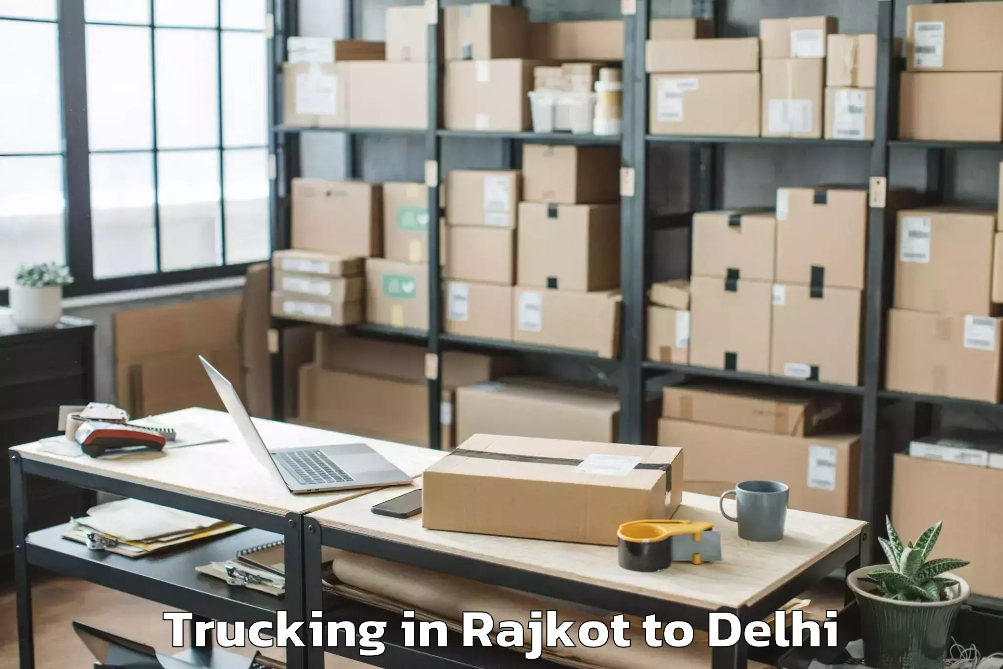 Affordable Rajkot to Unity One Janakpuri Mall Trucking